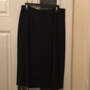 Lined black skirt, slight a-line, non-wrinkle.